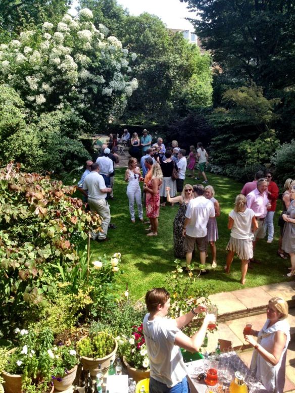 Bar-tender Tommy serving the drinks...