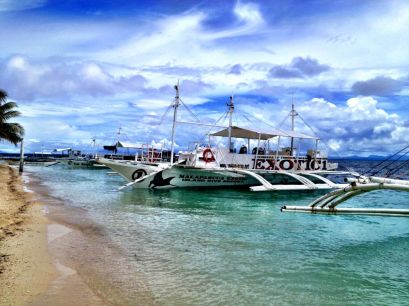 The dive boats - traditional fishing boats with outriggers