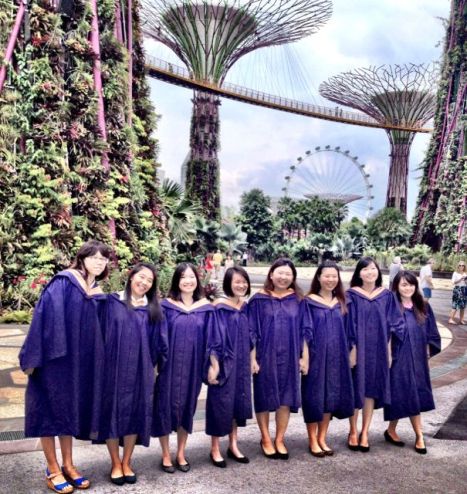 Economics grads posing for a team photo