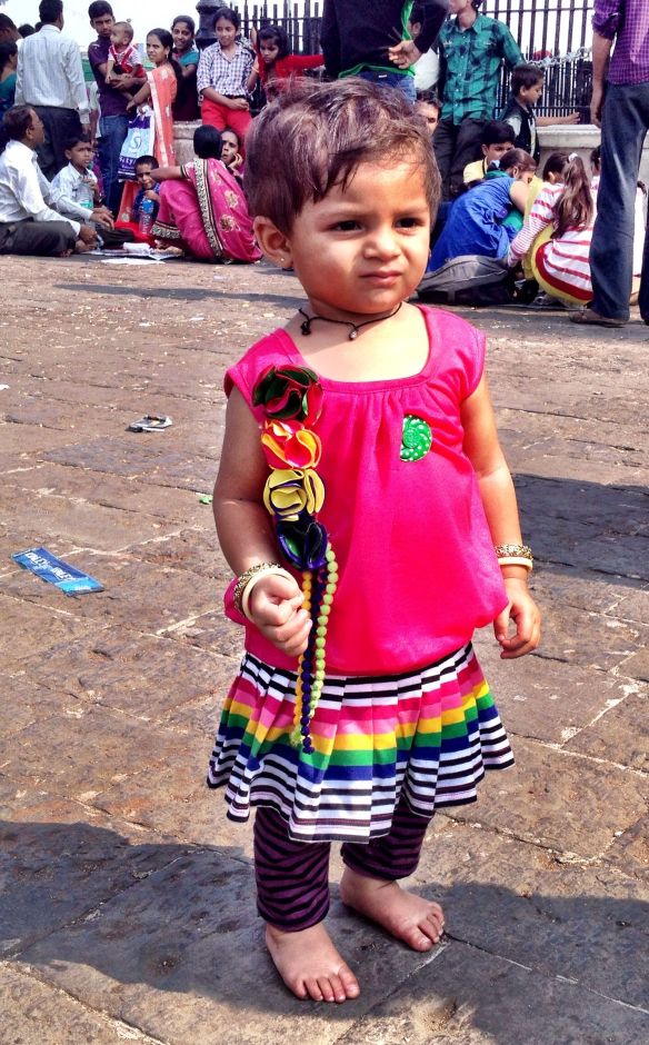 Posing rather against her will...