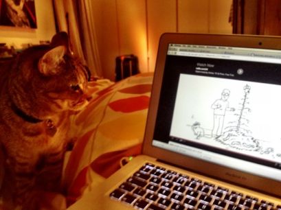 Pickle enjoying the Simon's Cat video xmas card