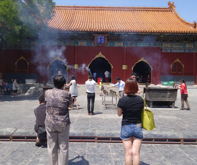 Offering incense at the Lama temple