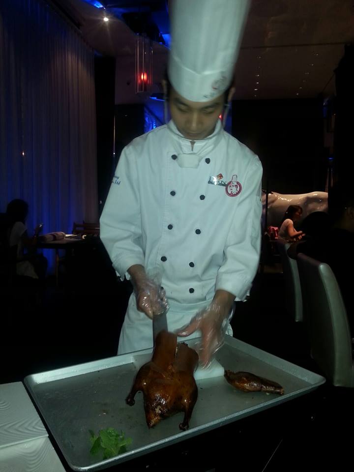 Carving the incomparable crispy duck