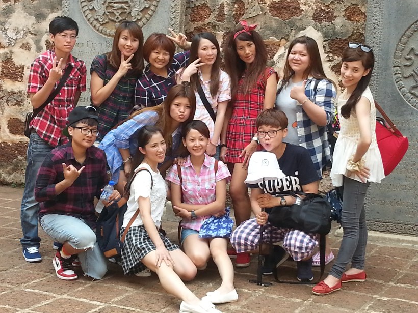 A group of kids in the ruins of St Pauls' church