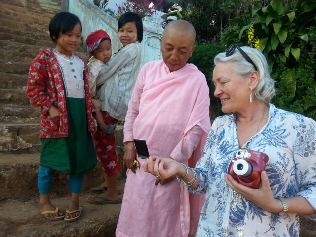 Hialry shares a photo wioht a nun