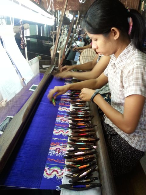Weaving silk longyis and wedding dresses