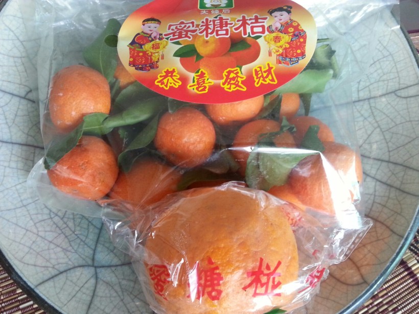 It's Chinese New Year next week - these jolly mandarins are everywhere; a taxi driver gave me teh big one!