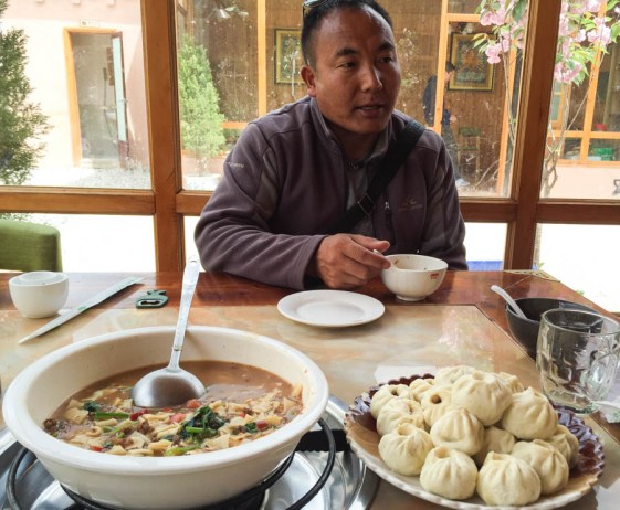 Yak dumplings and yak noodle soup on arrival in Shangri La, with our guide