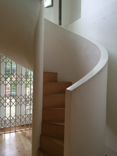 Spiral staircase and glass bridge