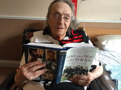 Auntie Rosemary getting her nose in the book