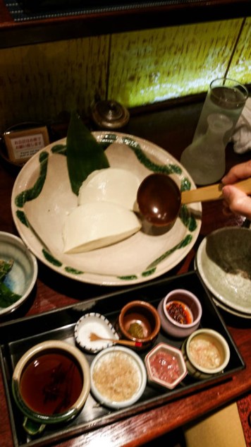 Fresh toy with all sorts of condiments - dried tuna, chilli, bonito, dried shrimp, salt