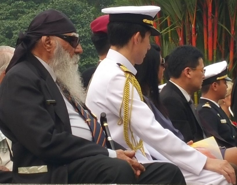 This marvellous civilian veteran laid a wreath; he is seated next door to Chinese and other hats!